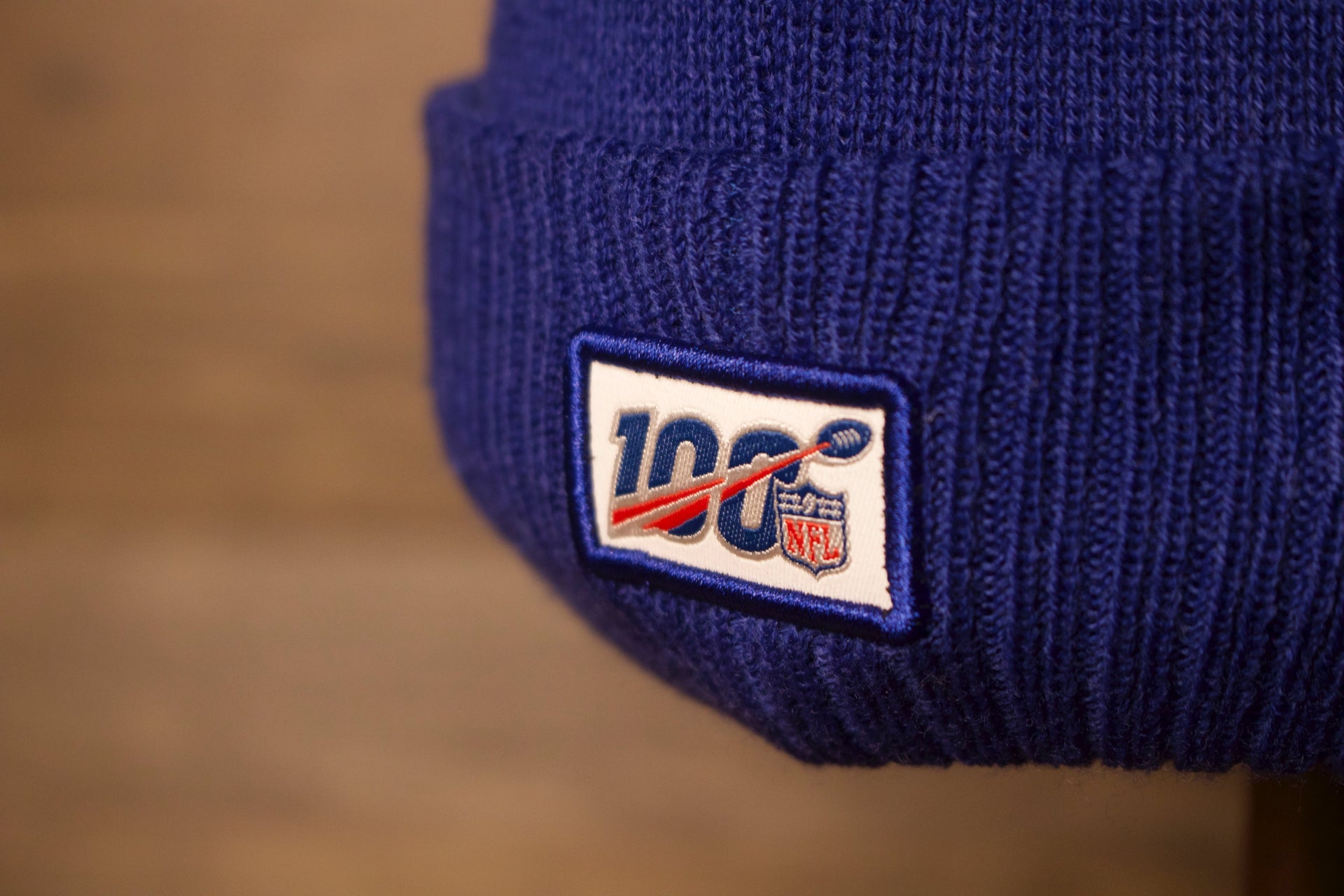 Giants Beanie | New York Giants 2019 On-Field Beanie | Giants Blue Winter Hat  the nfl patch is on the back with a white background