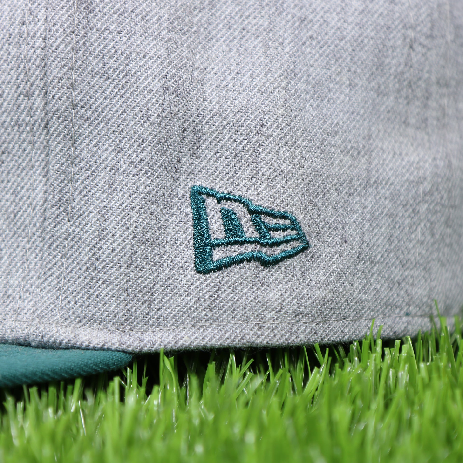 new era logo on the front of the Philadelphia Eagles 2018 On-Stage Draft 59Fifty Green Bottom Fitted Cap