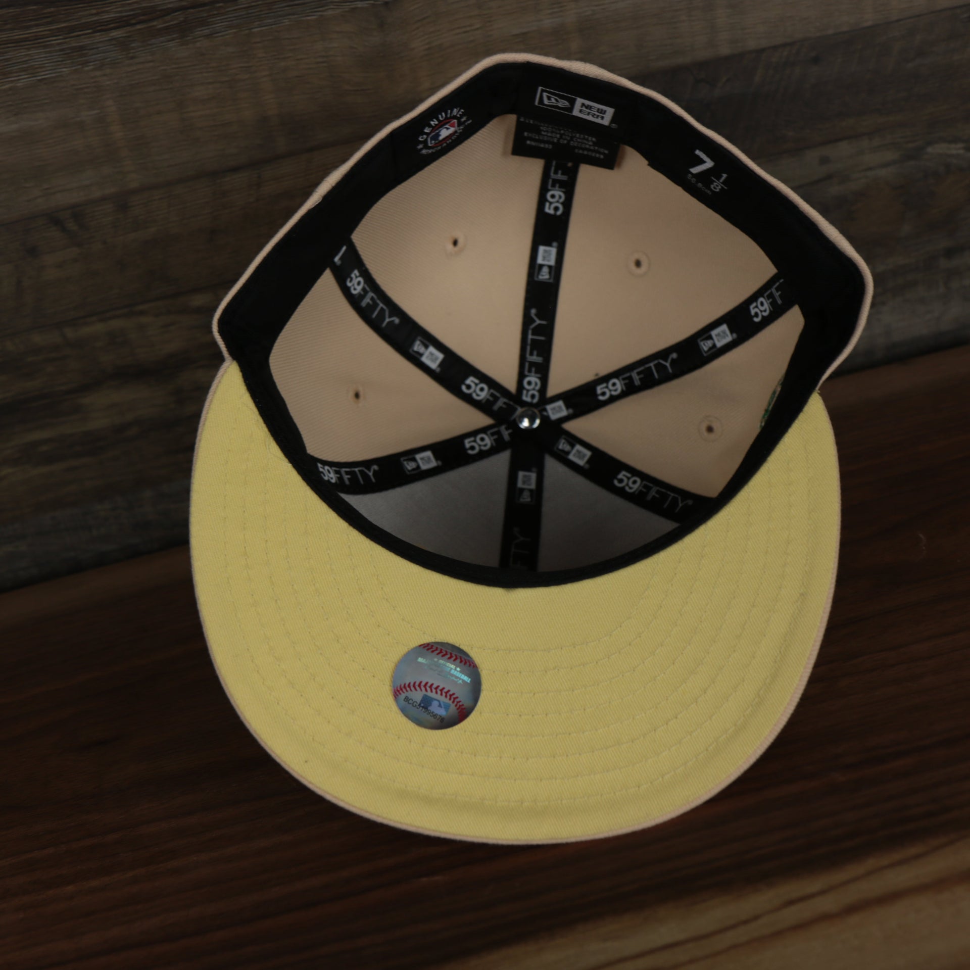 underside of the Atlanta Braves 1995 World Series Side Patch Yellow 59Fifty Fitted Cap | Peach | State Fruit