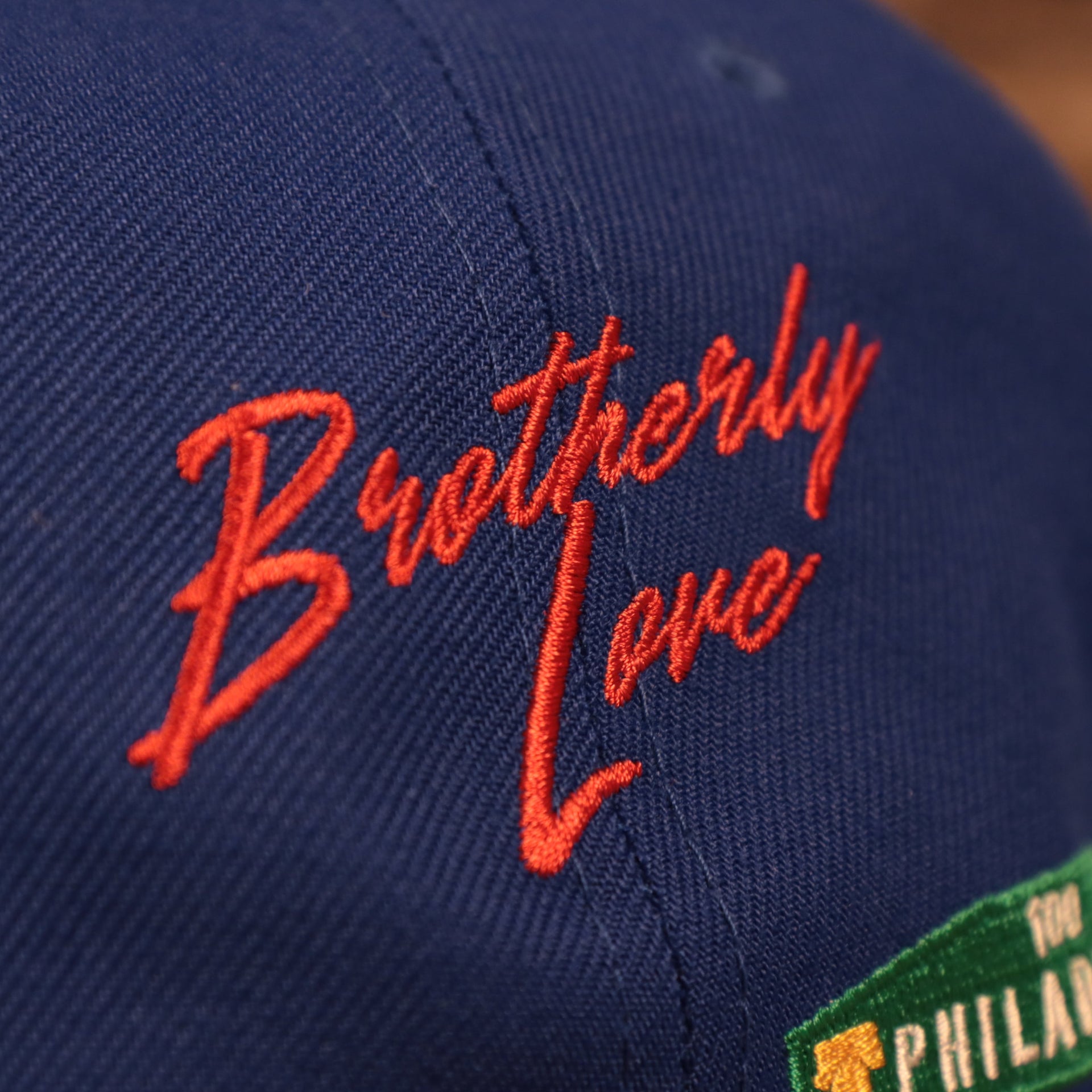 Brotherly Love script on the Philadelphia 76ers City Transit All Over Side Patch Gray Bottom 59Fifty Fitted Cap