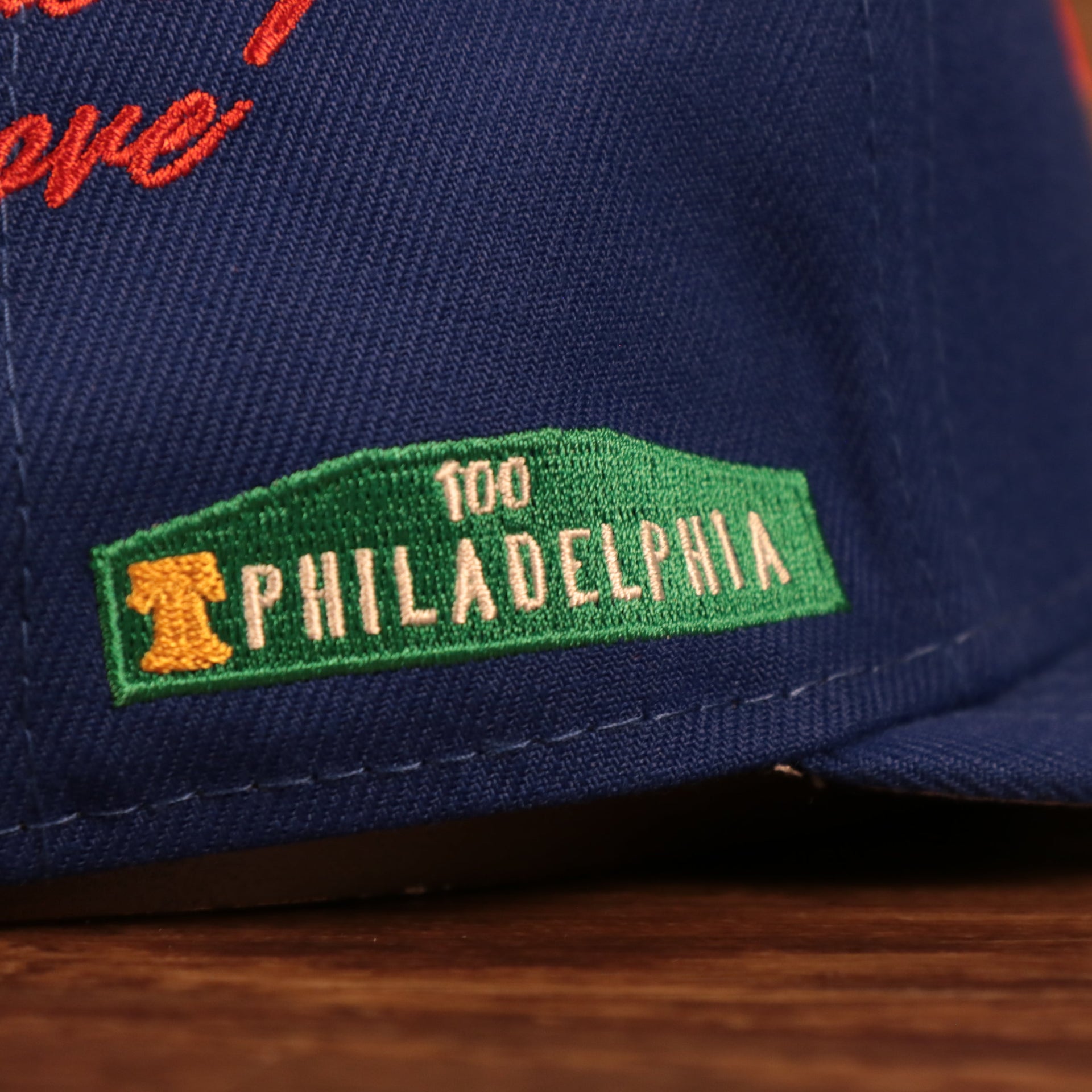 Philadelphia street sign side patch of the Philadelphia 76ers City Transit All Over Side Patch Gray Bottom 59Fifty Fitted Cap
