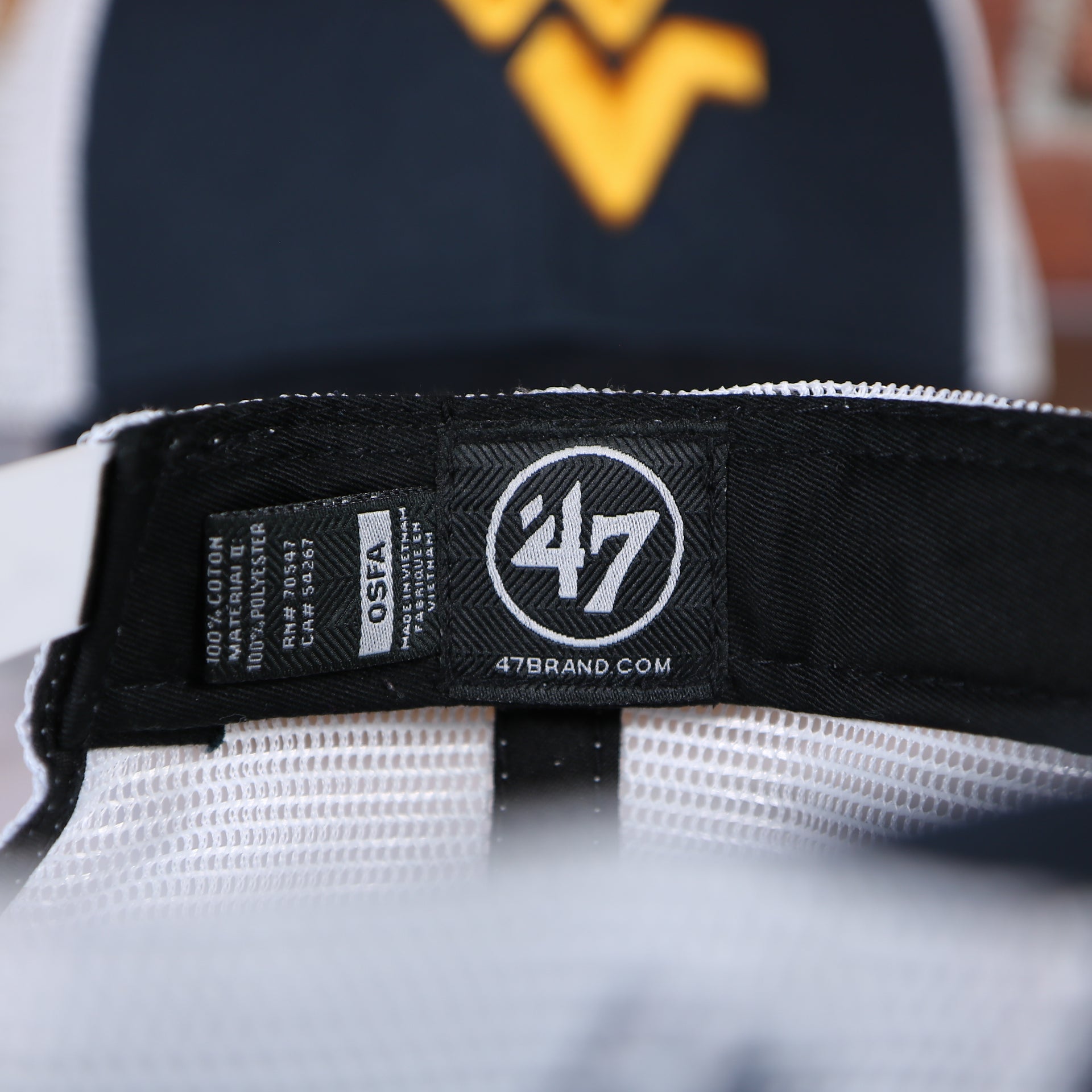 47 brand logo on the inside of the West Virginia Mountaineers MVP Yellow Bottom Trucker Cap | Navy/White | OSFM