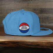 wearers right side of the  Denver Nuggets 2021 City Edition Vintage Grey Bottom 9Fifty Snapback | Light Blue