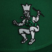 logo shot on the Boston Celtics 2021 City Edition Vintage Grey Bottom 9Fifty Snapback | Green