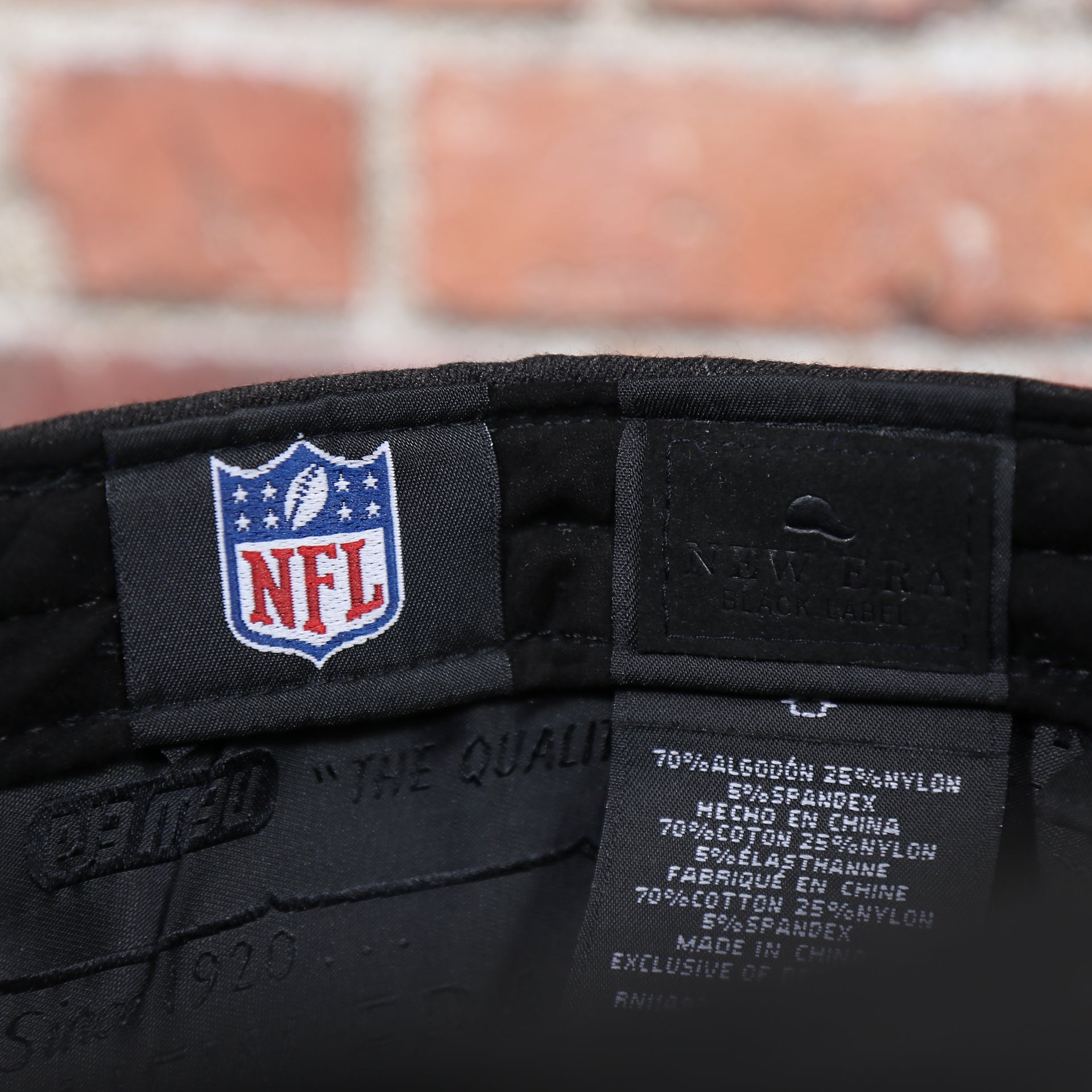 NFL Shield tag on the inside of the Philadelphia Eagles Jeff Cap Black Duckbill Hat | OSFM