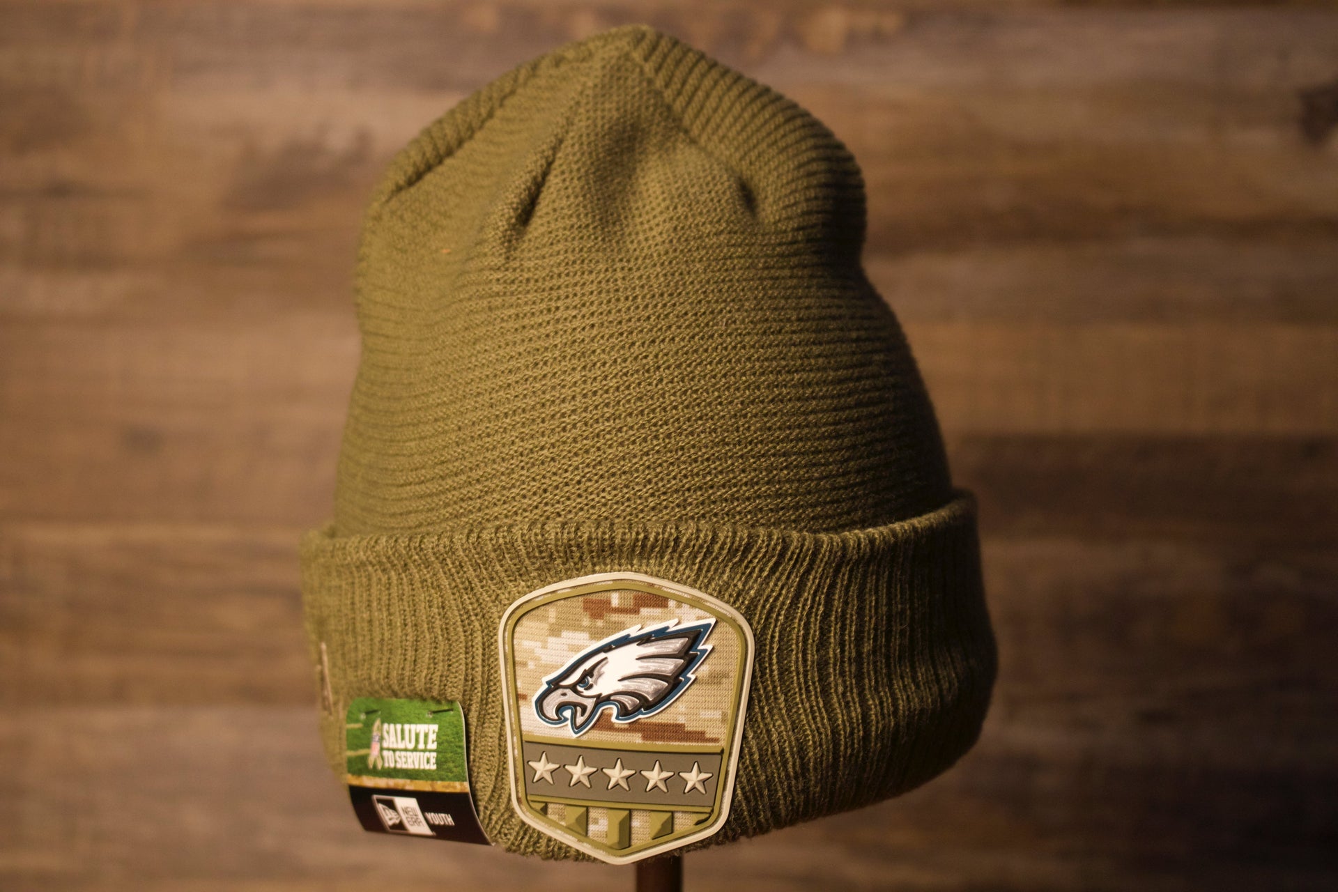 Eagles Youth Beanie | Philadelphia Eagles 2019 Salute To Service Beanie this eagles salute beanie is nothing on the top but the Eagles logo in a shield type of design on the front cuff