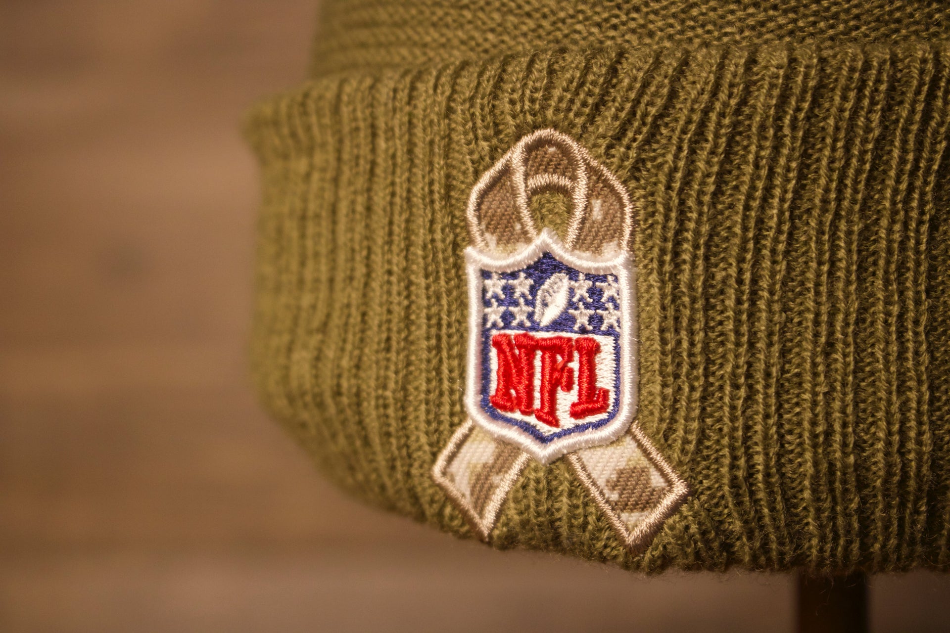 Eagles Youth Beanie | Philadelphia Eagles 2019 Salute To Service Beanie the military awareness ribbon is a camo ribbon and has the nfl shield in front of it