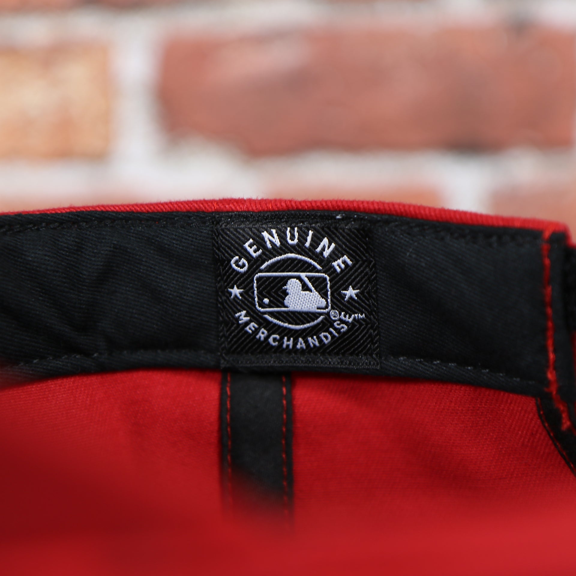 MLB label on the Infant Philadelphia Phillies Gray Bottom Dad Hat | Red Infant Dad Hat