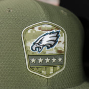 eagles logo on the Eagles Fitted Cap | Philadelphia Eagles 2019 Salute To Service Fitted Hat | 59Fifty Fitted Hat
