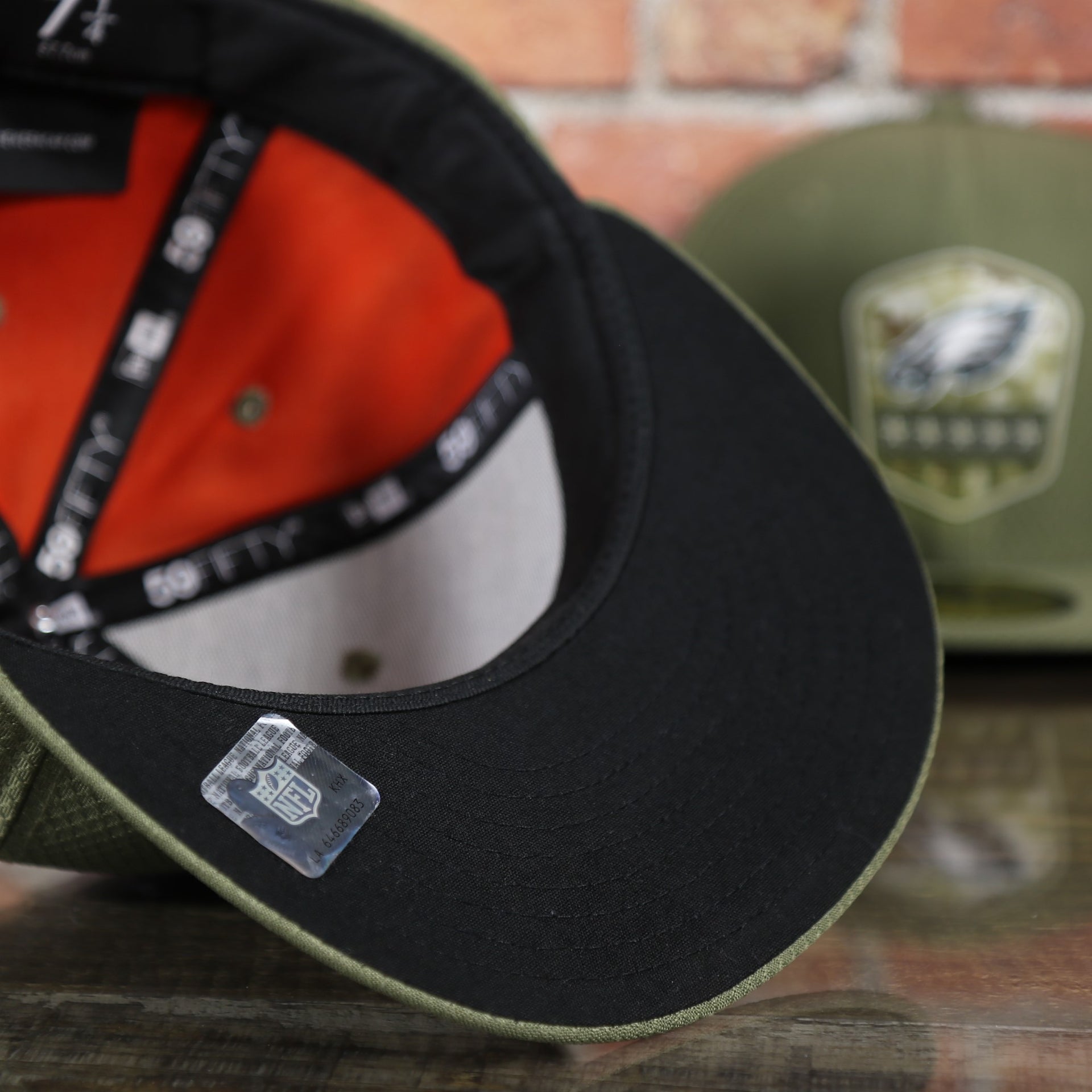 black under visor on the Eagles Fitted Cap | Philadelphia Eagles 2019 Salute To Service Fitted Hat | 59Fifty Fitted Hat