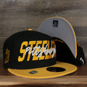 front and bottom of the Pittsburgh Steelers 2022 NFL Draft 9Fifty Grey Bottom On-Field Snapback | Black