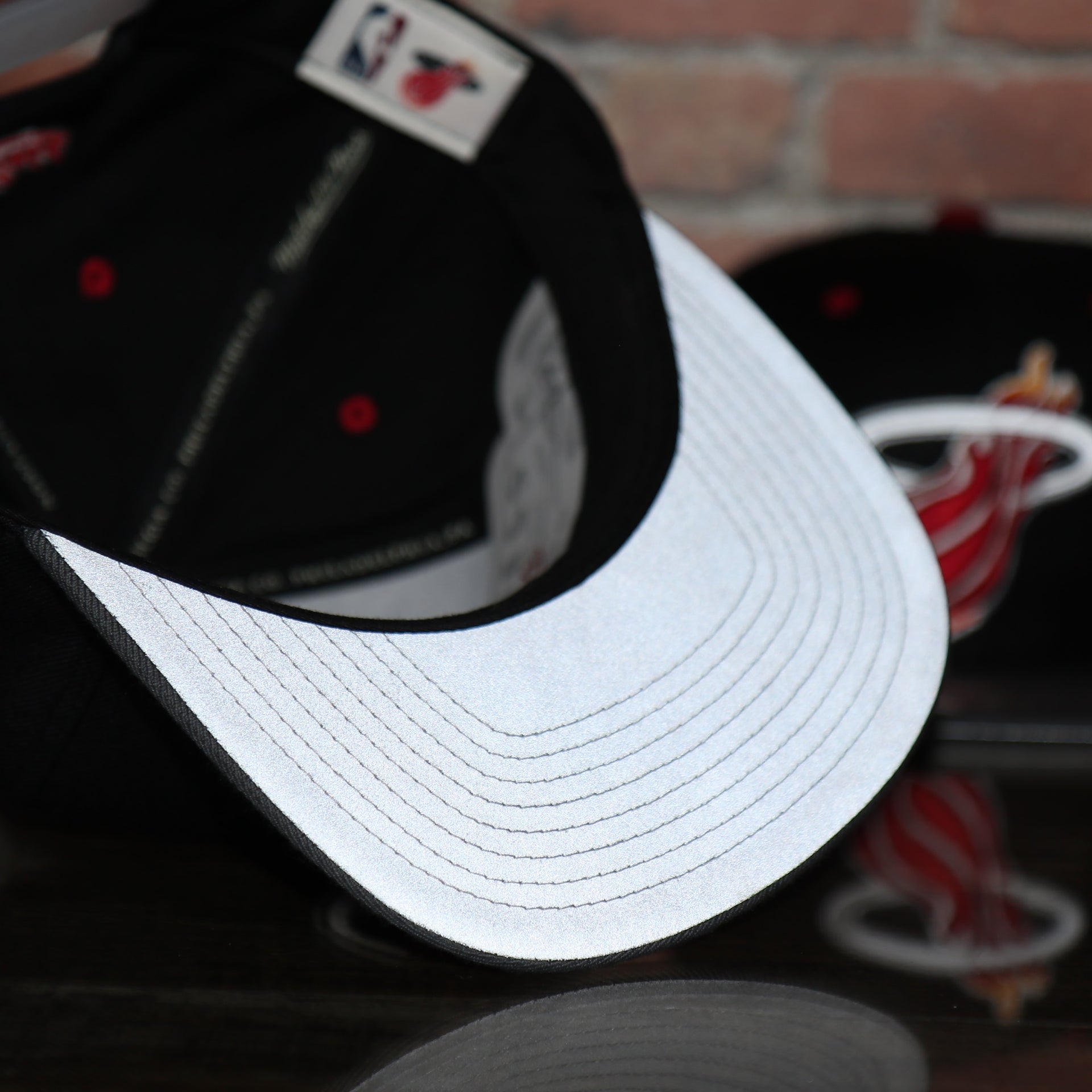 reflective under visor on the Heat reflective 3m snapback | Mitchell Ness Heat Snapback | Miami snapback heat