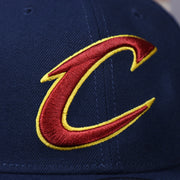 cavaliers logo on the Cleveland Cavaliers Classic Navy Blue Snapback Hat