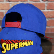 red adjustable snap on the Superman Vintage Lettering DC Comics Blue on Red Custom 950 Snapback Hat