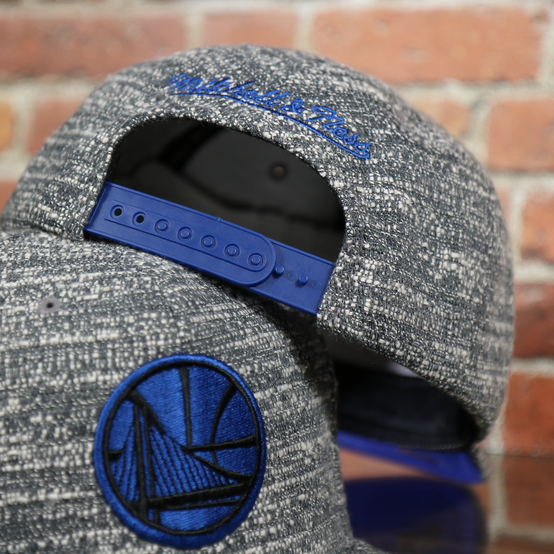royal blue adjustable snap on the Golden State Warriors Marbled Gray Noise Snapback Cap | Marbled Snap Cap
