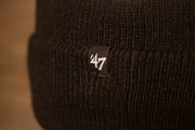 the 47 brand logo is in white Steelers Beanie | Pittsburgh Steelers Striped Winter Hat 