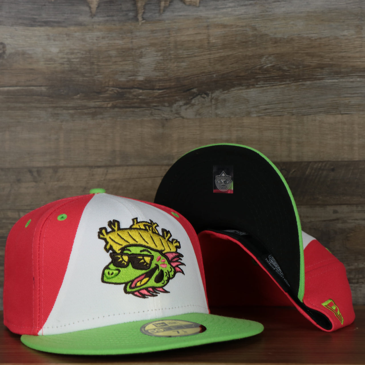 front and bottom of the Harrisburg Senators 2022 Playeros de Harrisburg Copa de la Diversion On-Field Black Bottom 5950 Fitted Cap | Orange