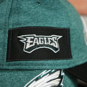 eagles side patch on the Philadelphia Eagles Onfield NFL Sideline Side Patch 39Thirty Flexfit Cap | Midnight Green 39Thirty Cap