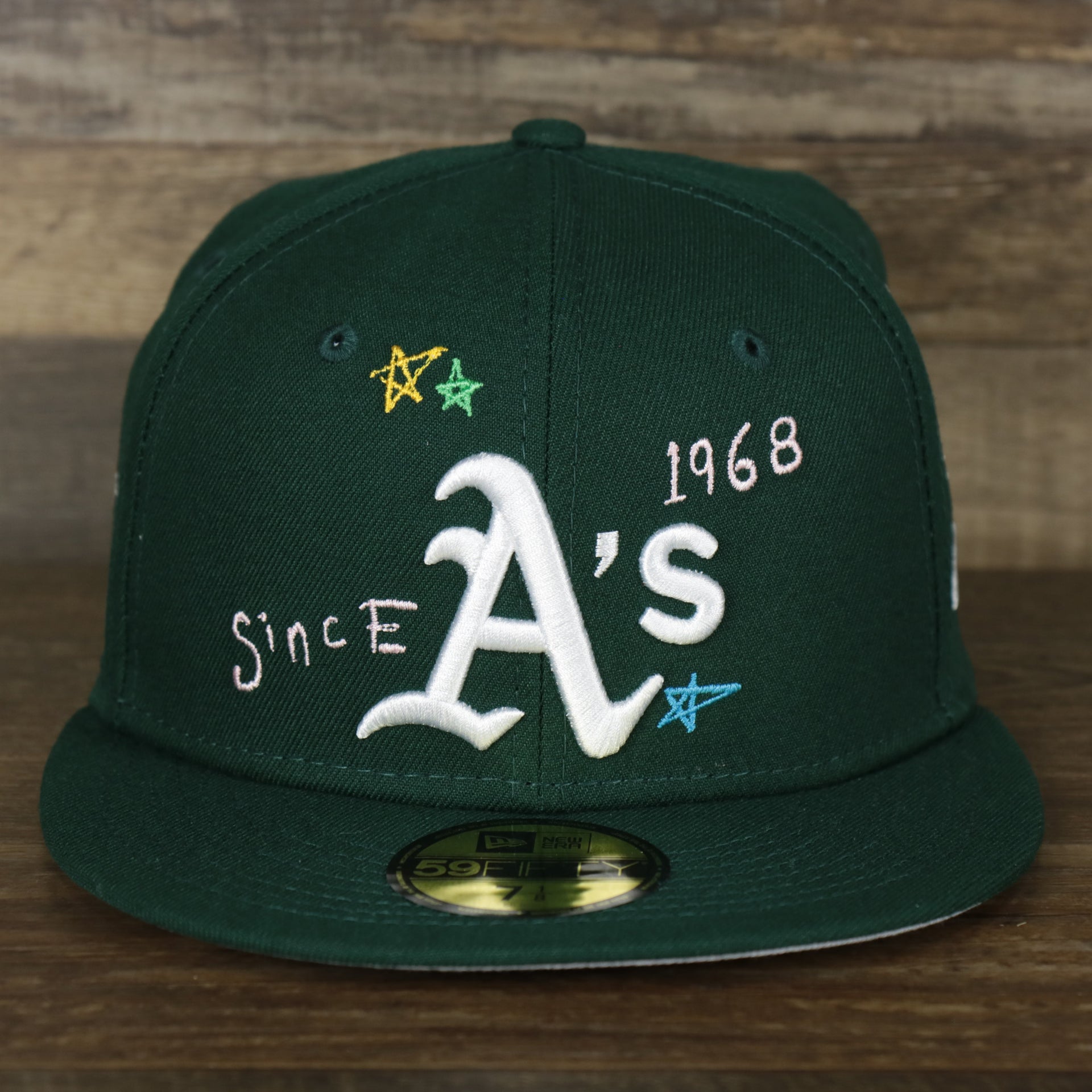 The front of the Oakland Athletics “Scribble” Side Patch Gray Bottom 59Fifty Fitted Cap