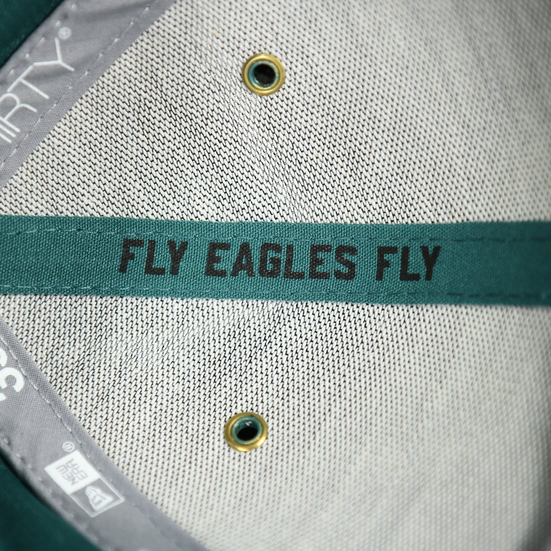 fly eagles fly taping on the Philadelphia Eagles Onfield NFL Sideline Side Patch 39Thirty Flexfit Cap | Midnight Green 39Thirty Cap