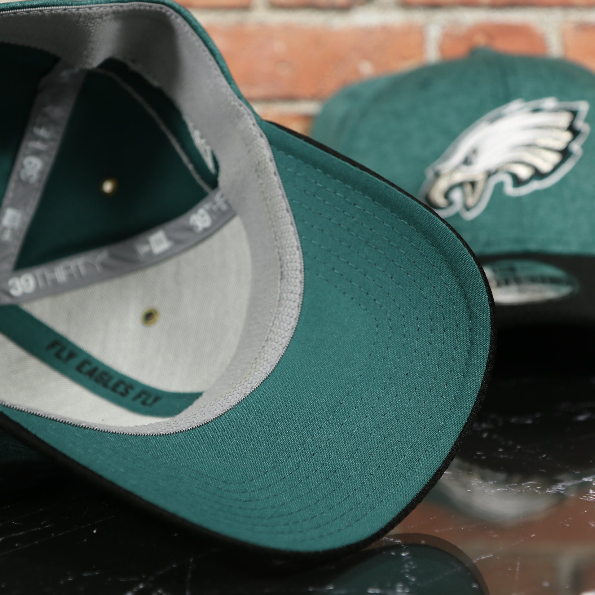 midnight green under visor on the Philadelphia Eagles Onfield NFL Sideline Side Patch 39Thirty Flexfit Cap | Midnight Green 39Thirty Cap