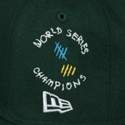 A close up of the worlds series champions patch on the Oakland Athletics “Scribble” Side Patch Gray Bottom 59Fifty Fitted Cap