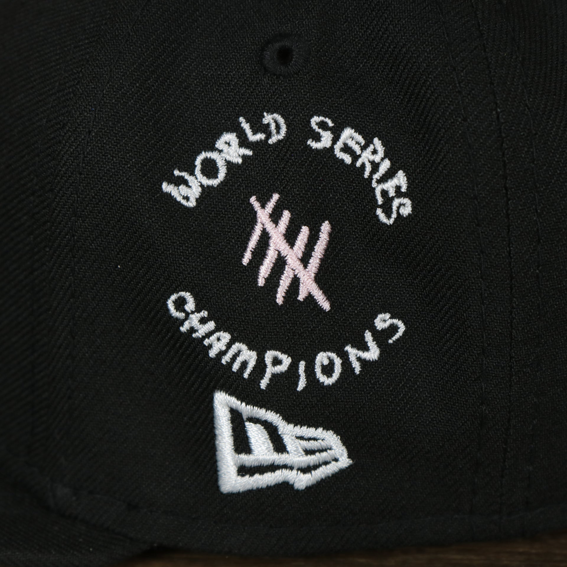 A closeup of the Worl Series Champions patch on the Pittsburgh Pirates “Scribble” Side Patch Gray Bottom 59Fifty Fitted Cap