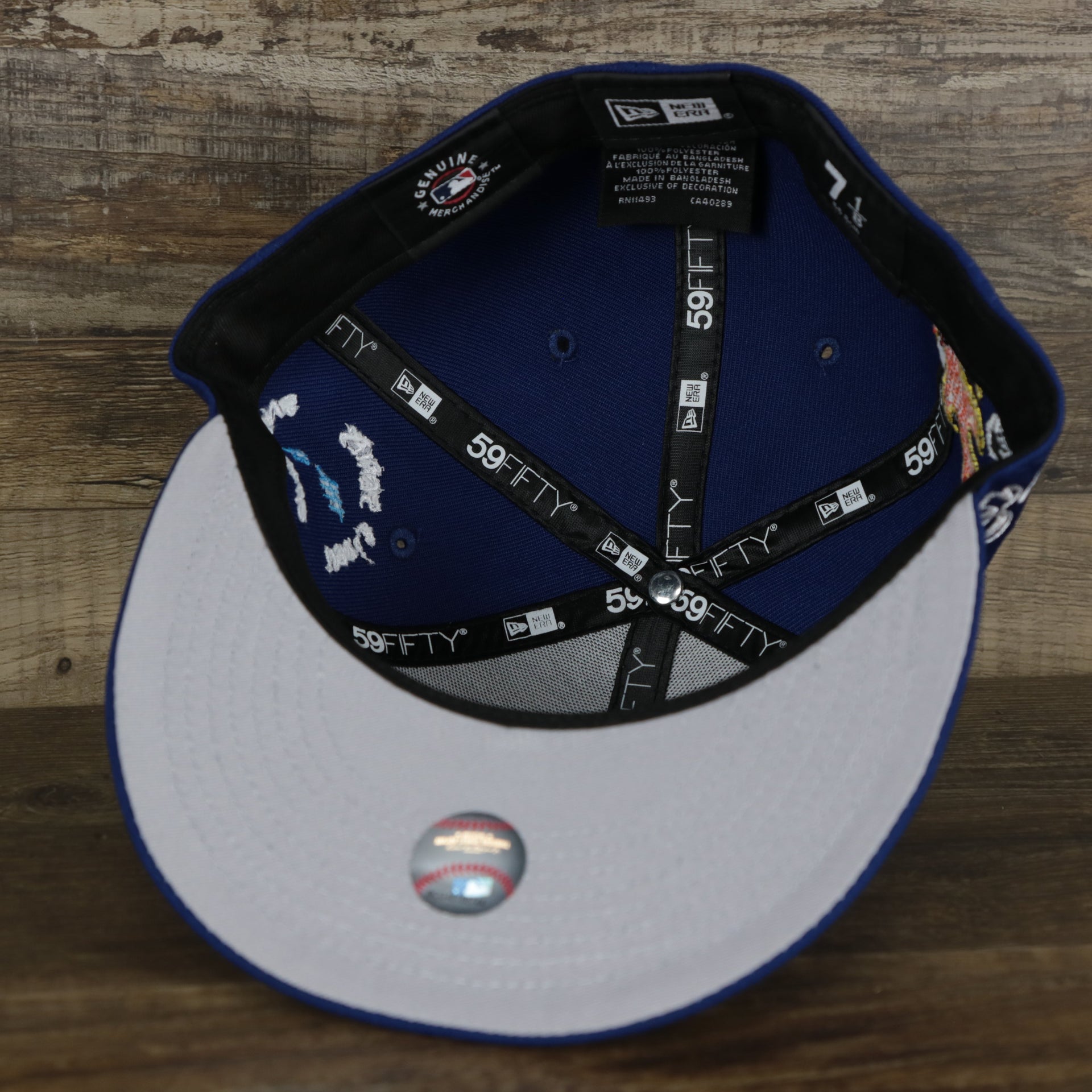 The underside of the Los Angeles Dodgers “Scribble” Side Patch Gray Bottom 59Fifty Fitted Cap