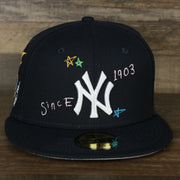 The front of the New York Yankees “Scribble” Side Patch Gray Bottom 59Fifty Fitted Cap