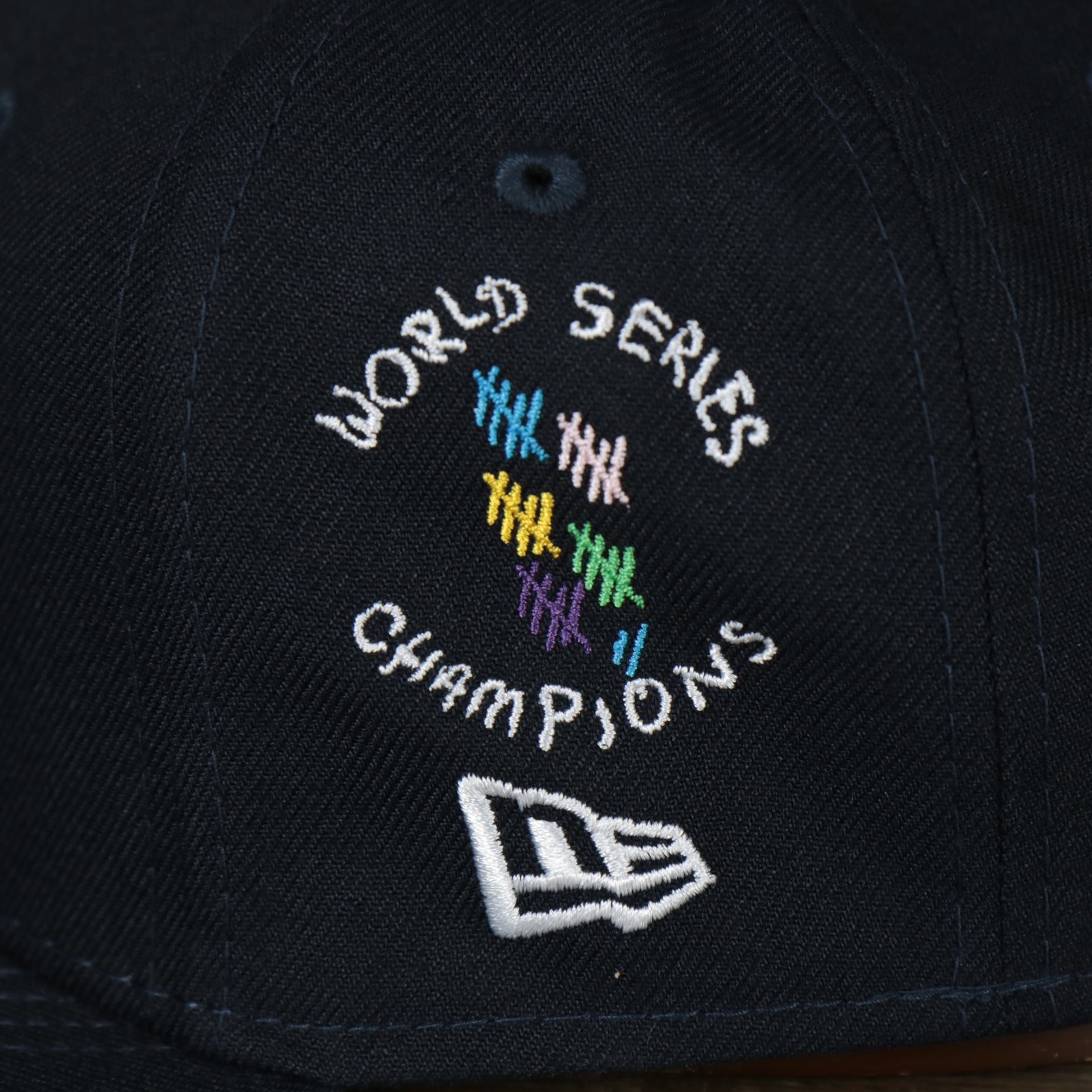 A close up of the World Series 27 Champions patch on the New York Yankees “Scribble” Side Patch Gray Bottom 59Fifty Fitted Cap