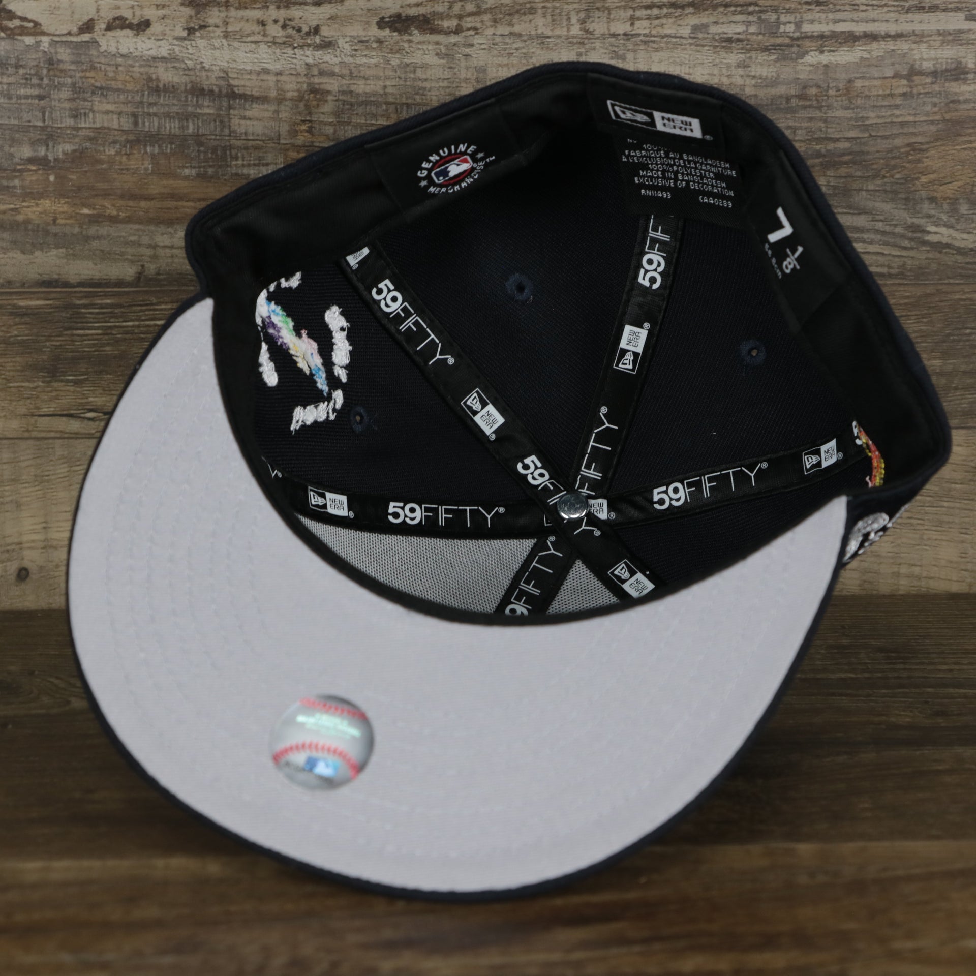 The grey undervisor on the New York Yankees “Scribble” Side Patch Gray Bottom 59Fifty Fitted Cap