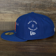 The wearer's left on the New York Mets “Scribble” Side Patch Gray Bottom 59Fifty Fitted Cap