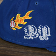 A close up of the side patch on the New York Mets “Scribble” Side Patch Gray Bottom 59Fifty Fitted Cap