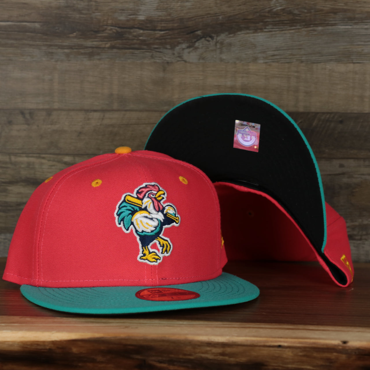 front and bottom of the Delmarva Shore Birds 2022 Gallos de Delmarva Copa de la Diversion On-Field Black Bottom 5950 Fitted Cap | Red