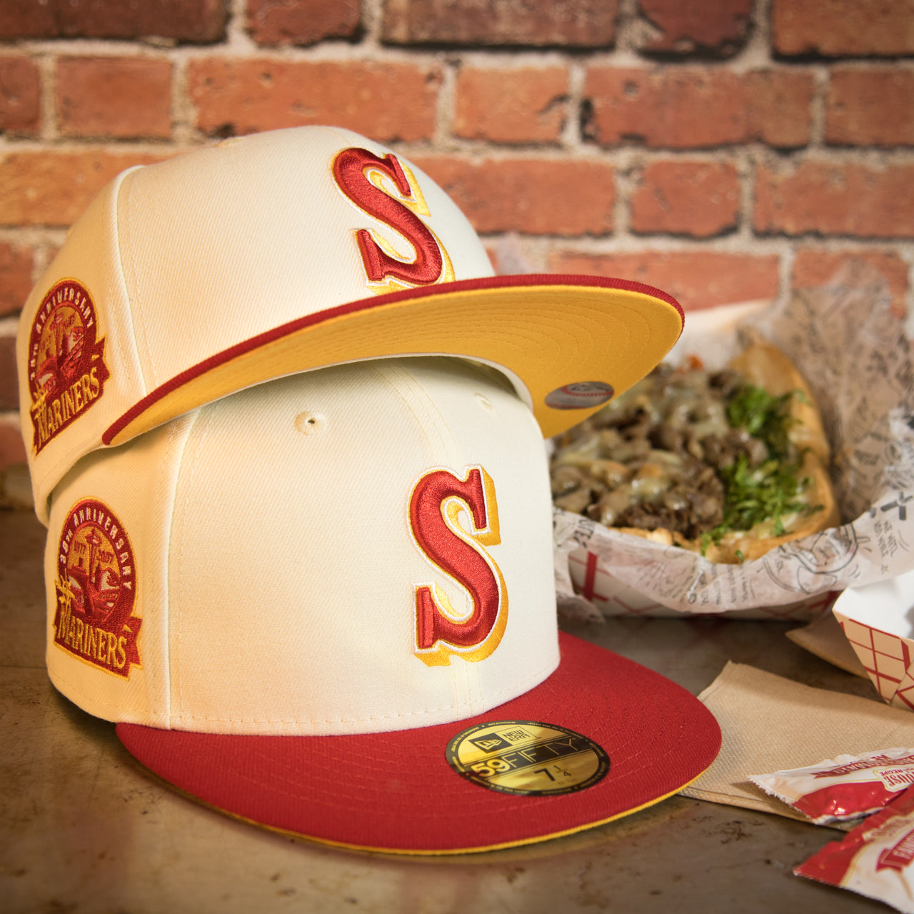 front of the Seattle Mariners Cooperstown 2007 30th Anniversary Side Patch Yellow UV 59Fifty Fitted Cap | Chrome/Red | CheeseSteak Pack Cap Swag Exclusive