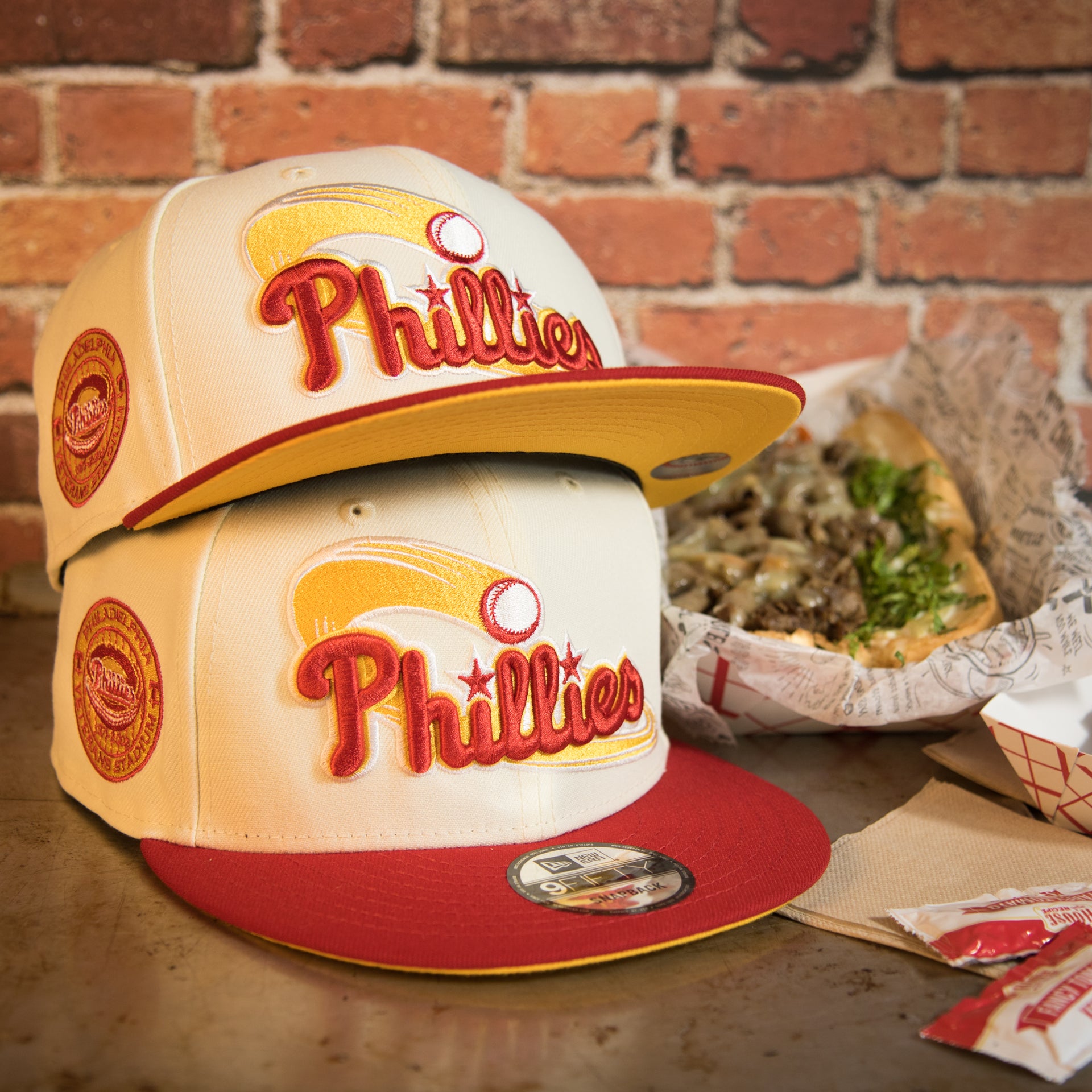 front of the Philadelphia Phillies Cooperstown Veterans Stadium Side Patch Side Patch Yellow UV 9Fifty Snapback Cap | Chrome/Red | CheeseSteak Pack Cap Swag Exclusive