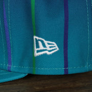 new era logo on the Charlotte Hornets 2021 Retro City Edition Gray Bottom 9Fifty Snapback | Blue
