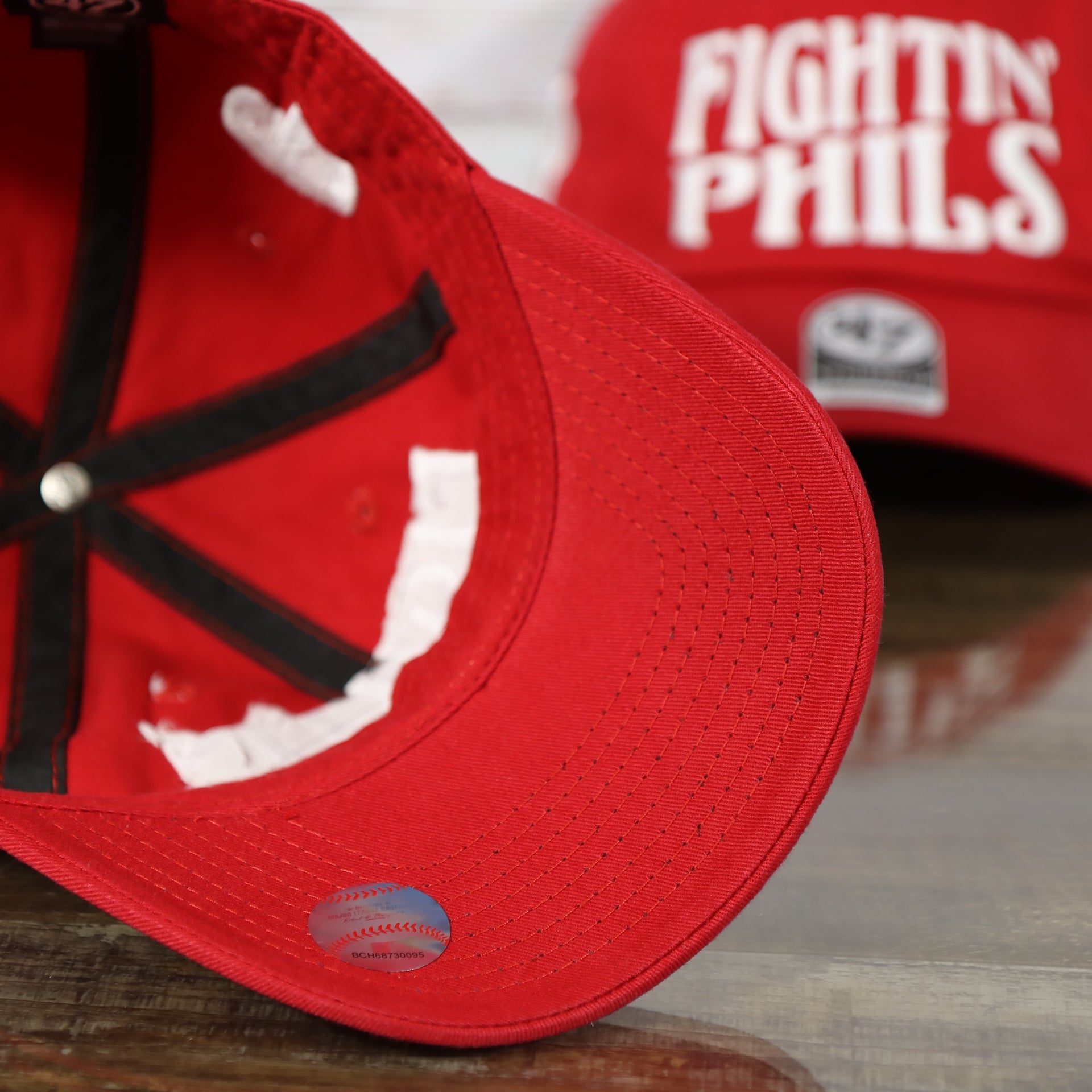 red under visor on the Philadelphia Phillies 2022 World Series Fightin' Phils Phillies Logo Side Patch Red Adjustable Dad Hat