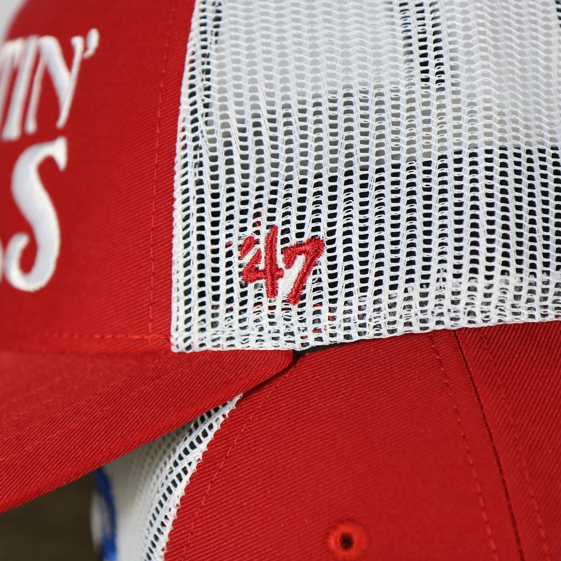 47 brand logo on the Philadelphia Phillies 2022 World Series Fightin' Phils Phillies Logo Side Patch Red Adjustable Trucker Snapback Hat