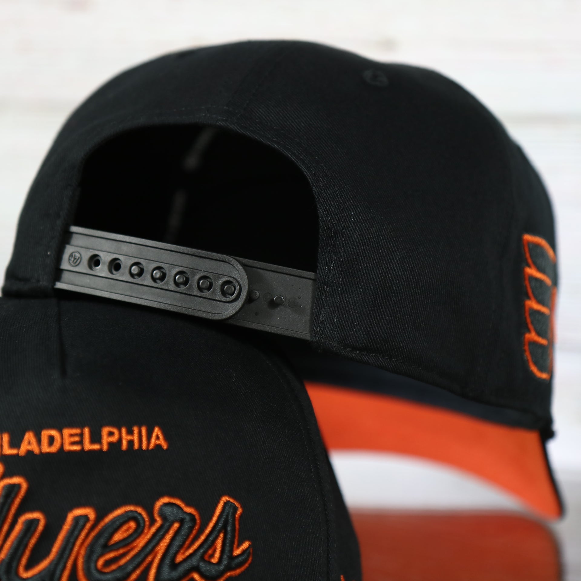 backside of the Philadelphia Flyers Black Snapback Dad Hat | Black Adjustable Baseball Cap