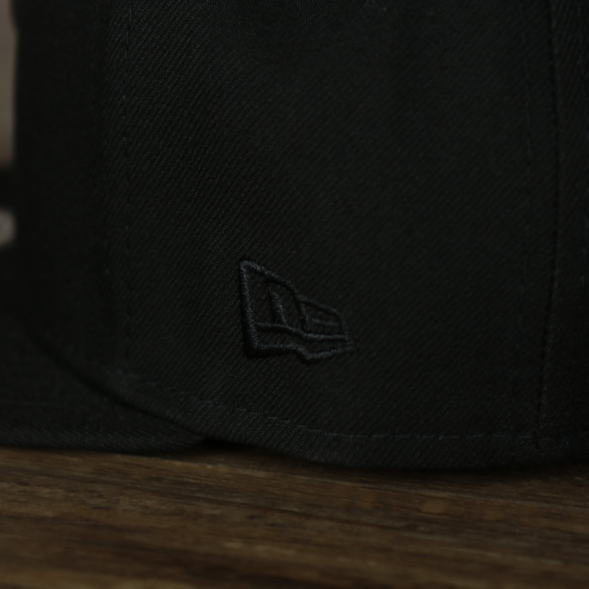 A close up of the New Era logo on the Philadelphia Phillies New Era Tonal 9Fifty Snapback