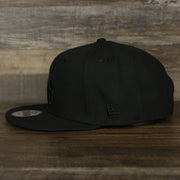 The wearer's left on the Philadelphia 76ers New Era Tonal 9Fifty Snapback