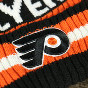 flyers logo on the Philadelphia Flyers Two Sided Cuffed Winter Beanie | Orange, White, And Black Winter Beanie