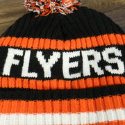 flyers wordmark on the Philadelphia Flyers Two Sided Cuffed Winter Beanie | Orange, White, And Black Winter Beanie