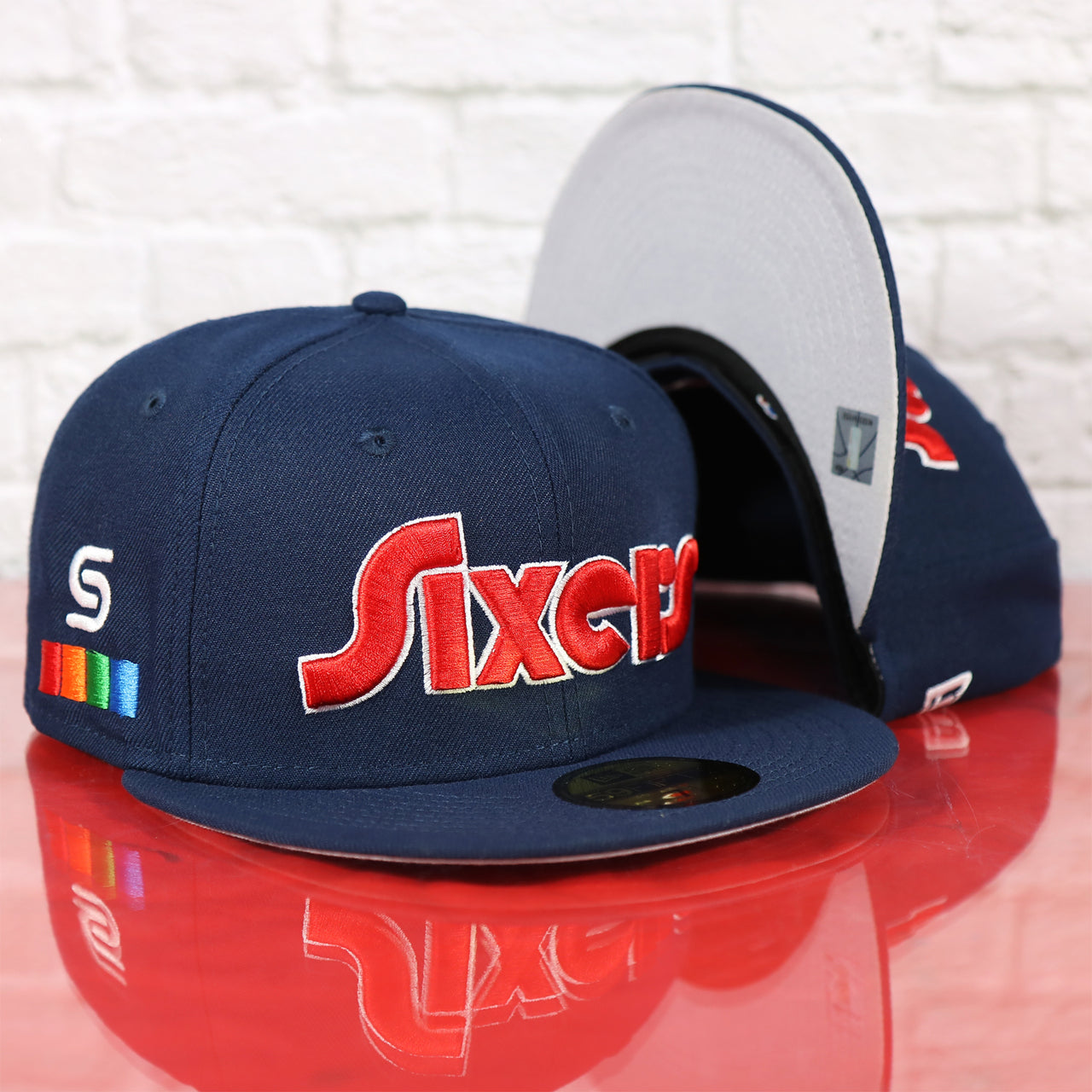Philadelphia 76ers 2022 City Edition Sixers Script Spectrum Side Patch Navy 59Fifty Fitted Cap