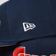 New Era logo on the wearer's left of the Philadelphia 76ers 2022 City Edition Sixers Script Spectrum Side Patch Navy 59Fifty Fitted Cap