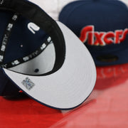 Grey under visor of the Philadelphia 76ers 2022 City Edition Sixers Script Spectrum Side Patch Navy 59Fifty Fitted Cap
