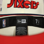 Labels on the interior of the Philadelphia 76ers 2022 City Edition Sixers Script Spectrum Side Patch Chrome/Navy 59Fifty Fitted Cap