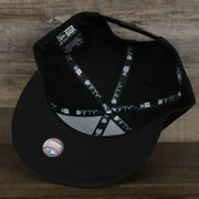 underside of the Chicago White Sox MLB City Connect 2021 On-Field 9Fifty Black Bottom Snapback | Black