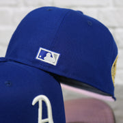 MLB cooperstown logo on the Philadelphia Athletics 1911 World Series Side Patch Pink Bottom Royal 59Fifty Fitted Cap | "The Athletics Pack"